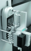Final testing machine for mobile telephones: pneumatic automation components used for simulation